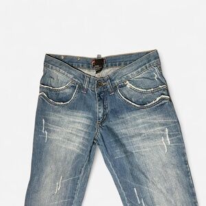 Diesel vintage archival Blue distressed denim jeans with a faded, worn look